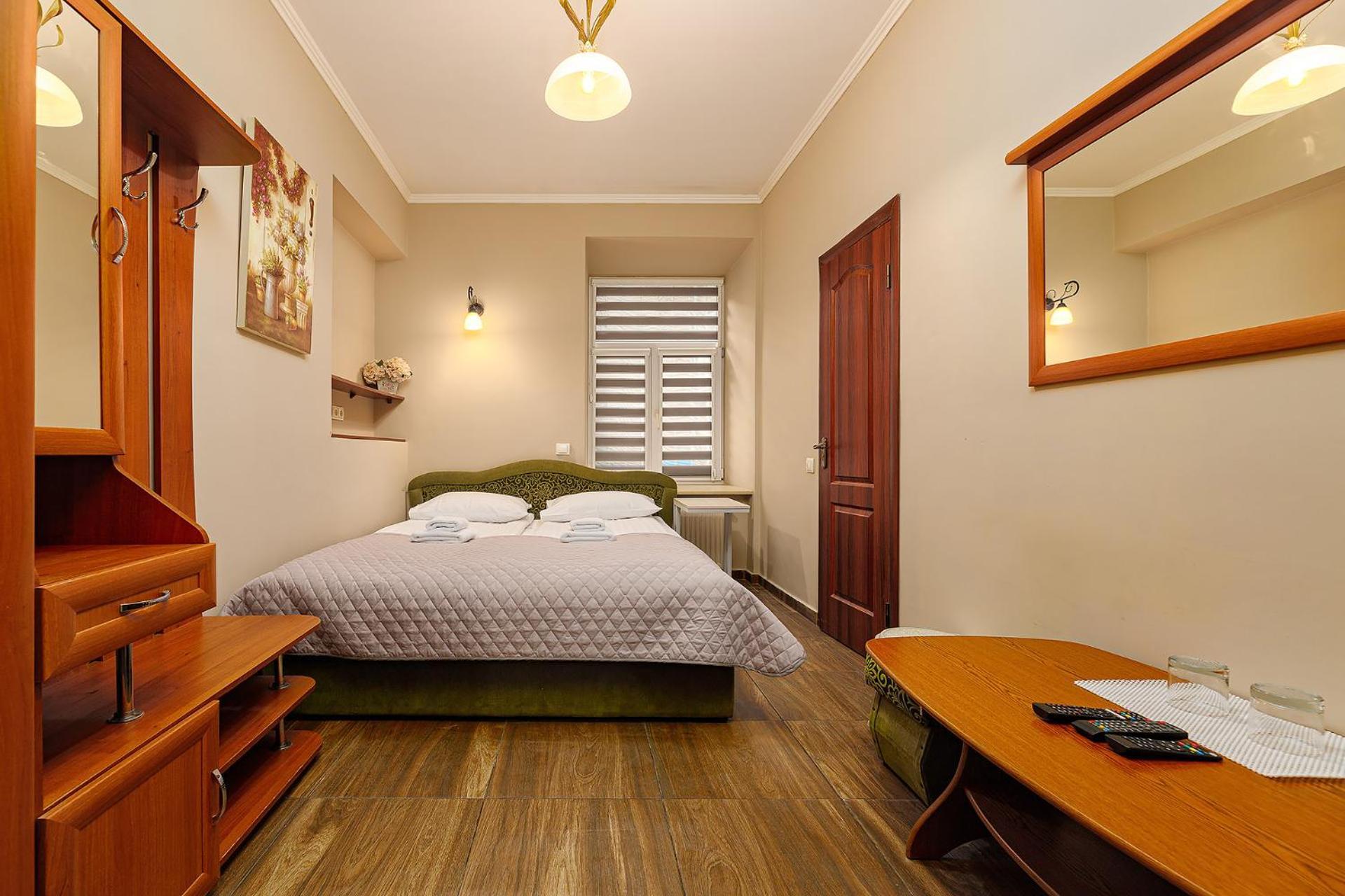 Hotel Kaiser Econom Lviv Chambre photo