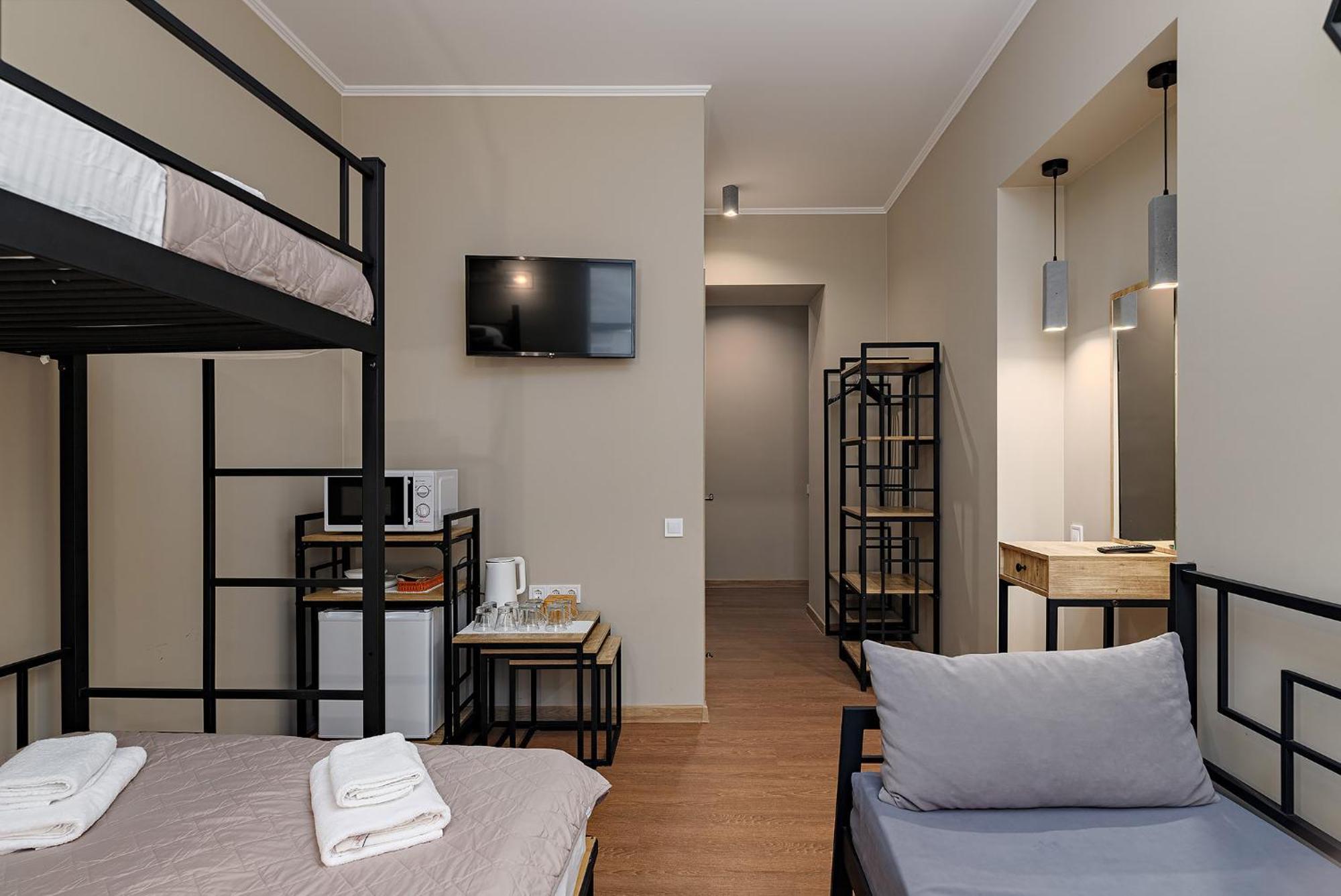 Hotel Kaiser Econom Lviv Chambre photo