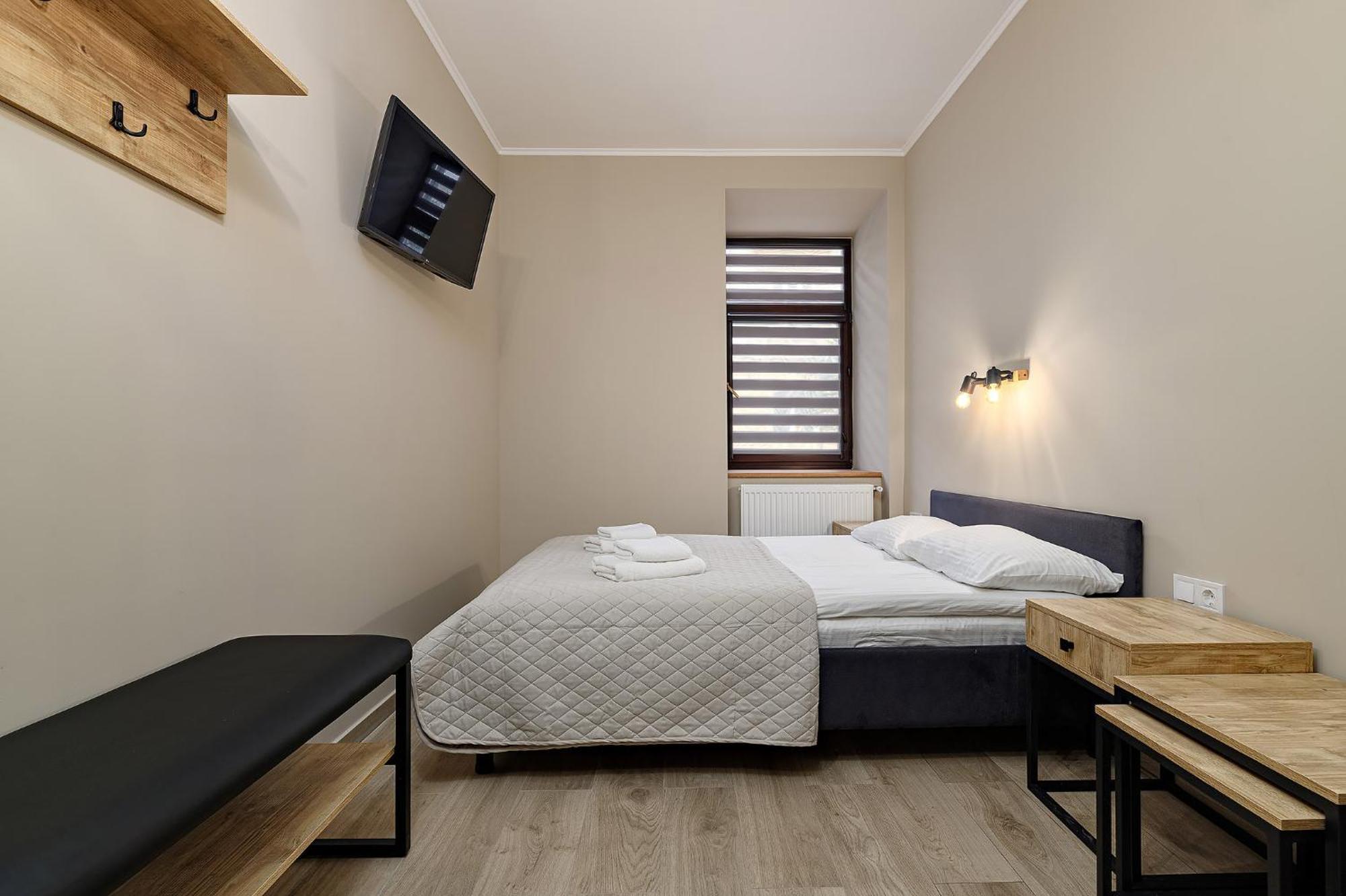Hotel Kaiser Econom Lviv Chambre photo