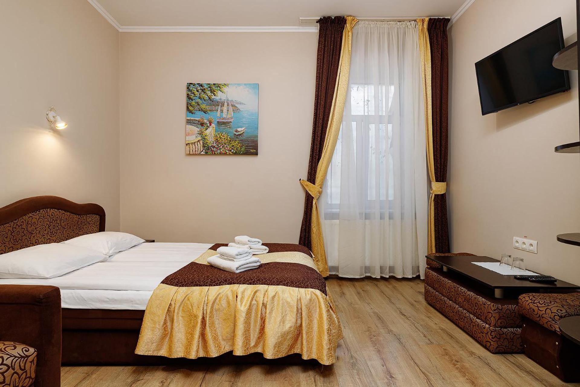 Hotel Kaiser Econom Lviv Chambre photo