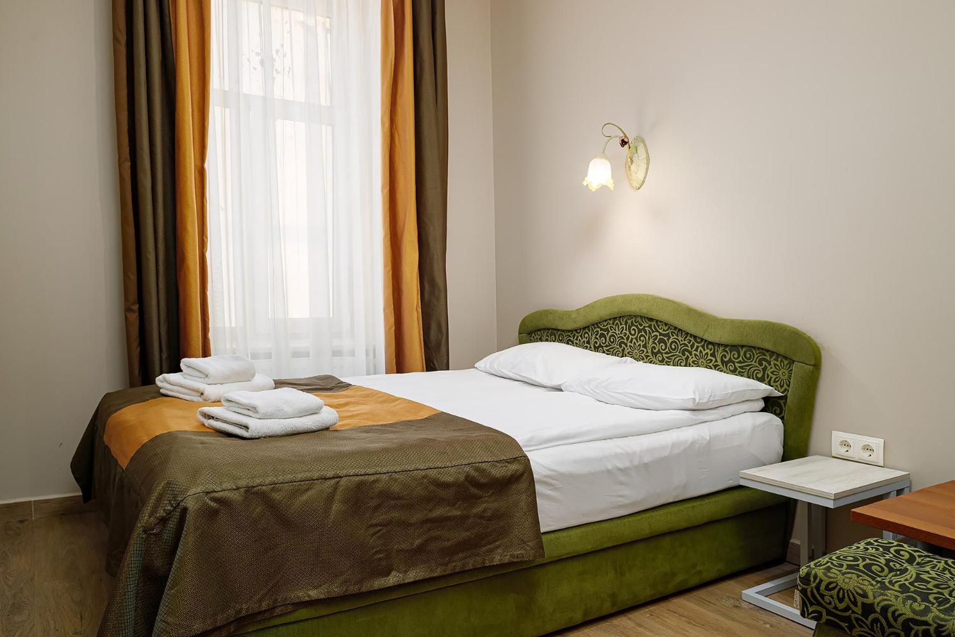 Hotel Kaiser Econom Lviv Chambre photo